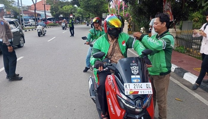 Ojol Bontang Gelar Aksi Pita Putih, Simbol Solidaritas dan Keadilan