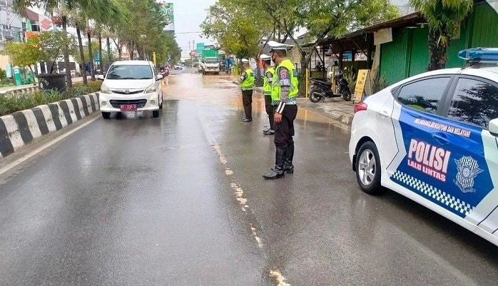 Personel Polres Bontang Selalu Berjaga Pagi dan Sore, Ada Tilang?