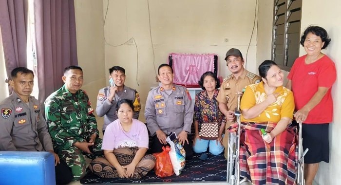 Ketuk Pintu Warga, Lurah Gunung Telihan Bontang Pastikan Bantuan Tepat Sasaran