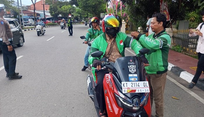Ojol Bontang Gelar Aksi Pita Putih, Simbol Solidaritas dan Keadilan